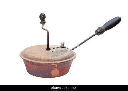 copper chestnut roaster isolated on white background, collection antique object Stock Photo