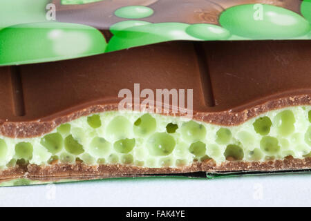 Nestle Mint aero new bubbly big bar of chocolate  with piece broken off to see inside set on white background Stock Photo