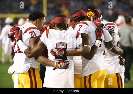 San Diego, CA. 30th Dec, 2015. USC players pray together before the game between the Wisconsin Badgers and the USC Trojans, National Funding Holiday Bowl, Qualcomm Stadium in San Diego, CA. Photographer: Peter Joneleit/Cal Sport Media. © csm/Alamy Live News Stock Photo