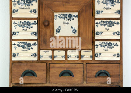 French Tea Coffee & Spice Kitchen Cabinet or Spice Rack Stock Photo