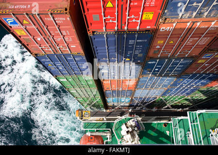 View of stacked containers in the stern of Container ship Corte Royal from high up on the Bridge. Stock Photo
