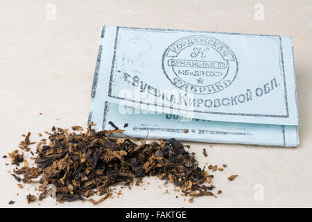 Soviet red army cigarette rolling paper pack from WW2 with some tobacco Stock Photo