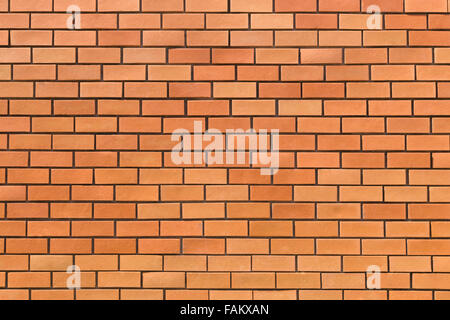 This wall was made from many pieces of bricks. Those bricks were produced from clay and had a brown or orange color. Stock Photo