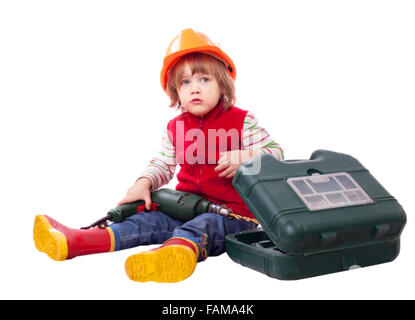 Child in builder hard hat with tools. Isolated over white background Stock Photo