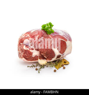 Raw lamb leg with bone, spices, isolated on white Stock Photo