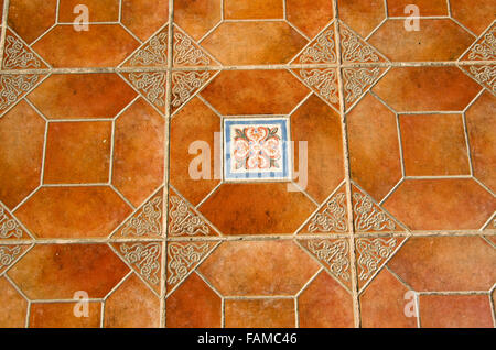 Background with ornamental brown and blue tiles Stock Photo