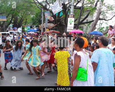 Philippines. 01st Jan, 2016. 'Aguman Sandok Festival' or 'Belles of Minalin' is the annual festival of Minalin, Pampanga where men cross-dress and they go dancing in the streets on New Year's Day to give laughter to towns-mates. The festival started in 1932 after the town had experienced extreme drought in 1931: to welcome 1932 with a big bang and to make the people smile after the calamity, a group of men started the new year of 1932 by wearing dress and it became a tradition every year for more than eight decades now. © Sherbien Dacalanio/Pacific Press/Alamy Live News Stock Photo