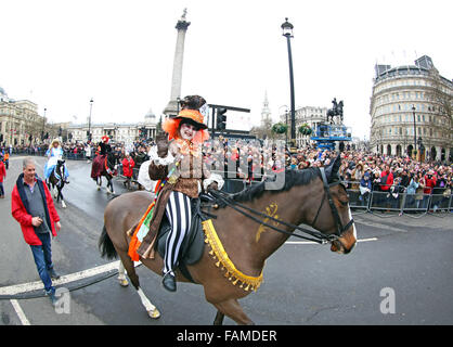 London, UK. 1st January 2016. Participant reiding a horse dressed as the Mad Hatter from Alice in Wonderland in the London New Year's Day Parade, London, England which saw more than 8,500 performers from 20 countries worldwide taking part. With competitions between the London Boroughs and American marching bands and many, many horses it was certainly a great spectacle to start the year. Credit:  Paul Brown/Alamy Live News Stock Photo