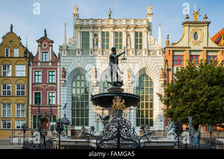 Neptune's statue and fountain in front of Artus Manor in Gdansk old town, Poland. Stock Photo