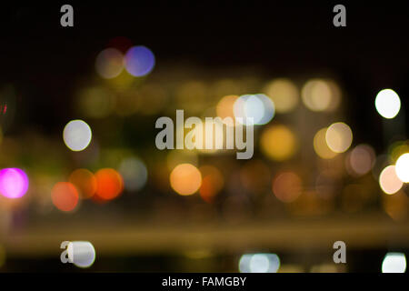 Artistic style -Background of blurred street lights in the night Stock Photo