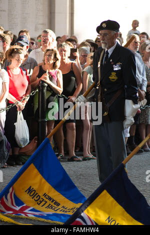 Menhin Gate, members of the Royal British Legion lower standards at the evening act of remembrance. Stock Photo