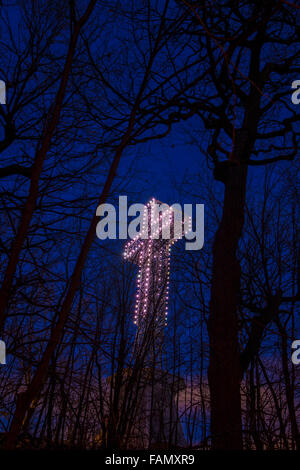 Mont Royal cross in Montreal city at dusk Stock Photo