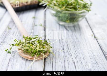Portion of Cress (close-up shot) on rustic wooden background Stock Photo