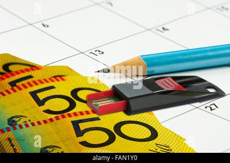 calander background with money pencil and USB Stock Photo