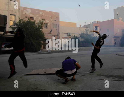 Protesters throw stones during an anti-government protest in Tirana ...