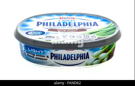 Philadelphia Medium Fat Soft Cheese with Spring onion & Black Pepper on a white background Stock Photo