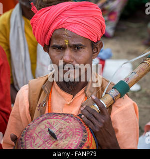 Man playing a homemade sitar, Pushkar, Rajasthan, India Stock Photo