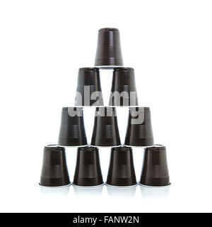 Pyramid of plastic cups isolated on white background Stock Photo