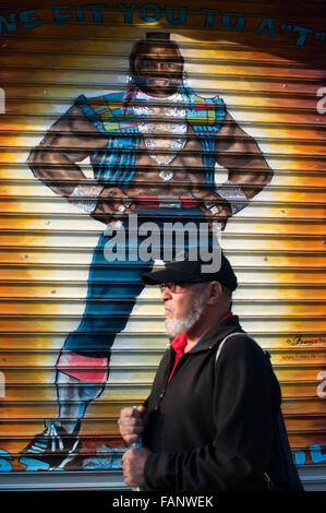 NEW YORK, Graffiti painted in the shade of an establishment of Harlem. In New York in black and suburbs as the Bronx, Brooklyn and Harlem, the birth of graffiti occurred. While you can find different backgrounds, with Taki 183 was made popular the tag, a young man who filled the streets with your pseudonym. Stock Photo