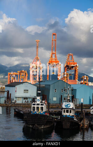 Tugboats waiting for work close to the Port Vancouver container dock Stock Photo