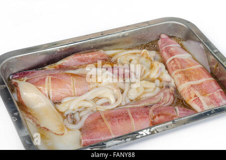Preparation of raw squid and ingredients , ready to grill Stock Photo