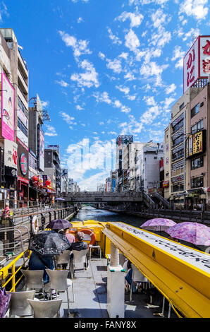 Boating, Dotonbori canal, Dotonbori district, Osaka, Japan Stock Photo