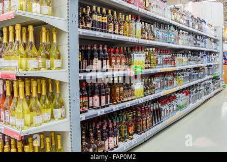 Showcase alcoholic beverages at the hypermarket Karusel Stock Photo