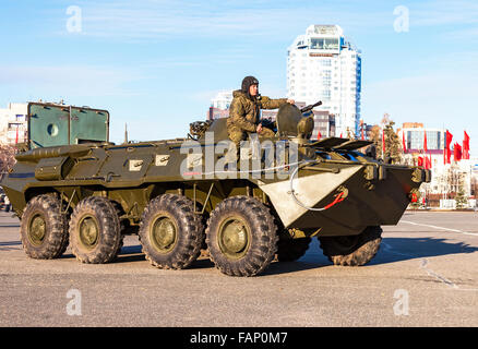 Army armored personnel carriers on the central square in sunny day Stock Photo