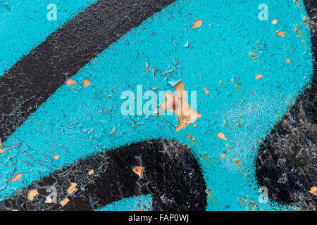 Detail of a blue graffiti on a wall Stock Photo