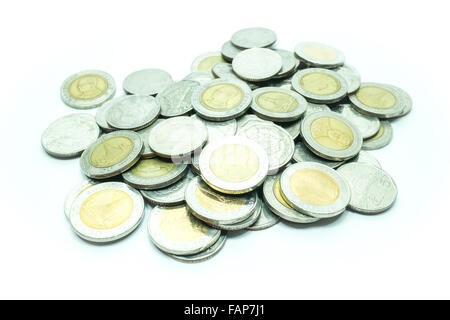 Group of Thai baht coins on white table background, stock photo Stock Photo