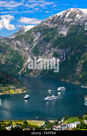 Three cruise ships in the Geirangerfjord, Geiranger, Norway Stock Photo