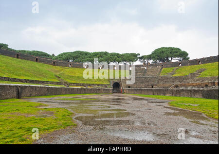 Amphitheatre in ancient Roman city of Pompei, Italy. It's the oldest surviving Roman Amphitheatre. Pompei was destroyed and buri Stock Photo