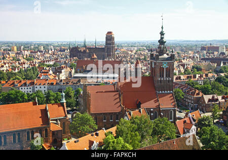 Bird eye view of St. Catherine Church, St. Mary Church and roofs of Gdansk city center, Poland Stock Photo