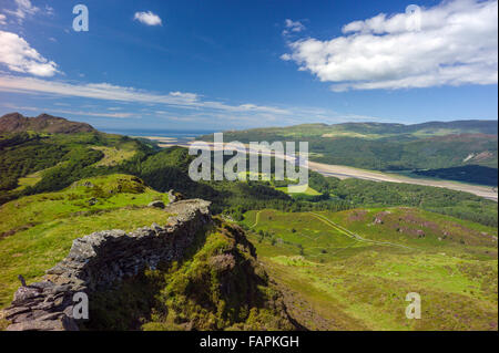 A view taken high on the southern side of the Mawddach valley looking westwards down the river towards Cardigan Bay and Barmouth Stock Photo