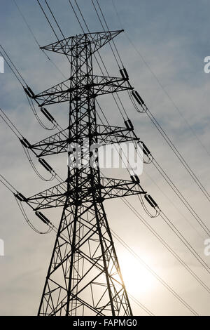 Silhouette of high voltage electric tower Stock Photo