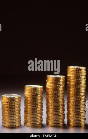 numbers stack of coin form a graph Stock Photo