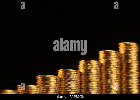 numbers stack of coin form a graph Stock Photo