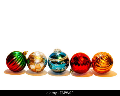 Row of five Christmas tree baubles on a white background Stock Photo