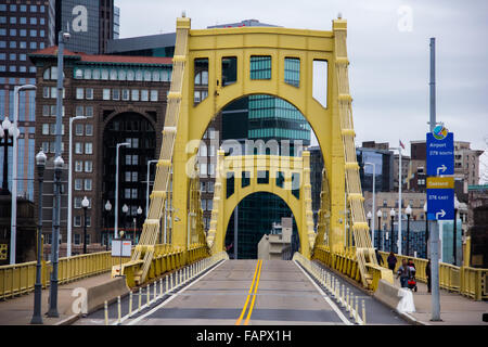 Pittsburgh's Gold bridge with the city landscape in the background Stock Photo