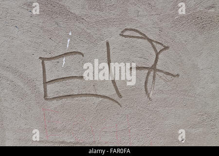 E17 written in concrete in side of building in Walthamstow, north-east London. Stock Photo