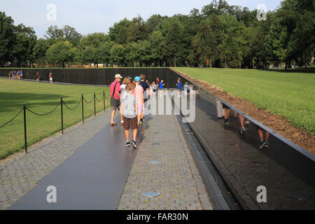 The Vietnam Veterans' Memorial, with the names of those who died in this war carved in a black, granite wall, in Washington DC Stock Photo