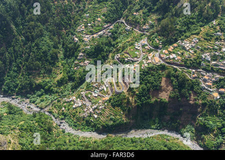 Madeira - Val des Freiras. Hairpin bend roads in the valley below the town of Curral des Freiras. Stock Photo
