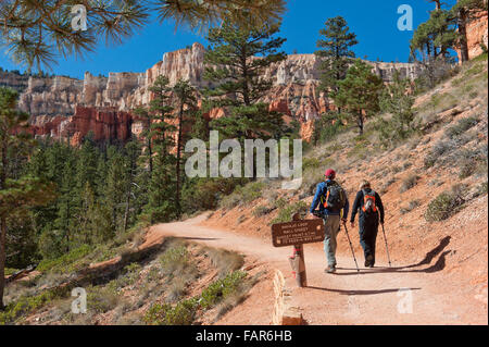 Two hikers on a trail in Bryce National Park. Stock Photo