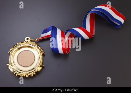 Gold medal isolated on the background. Stock Photo