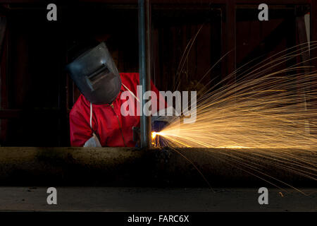 Metal cutting with acetylene torch in factory Stock Photo