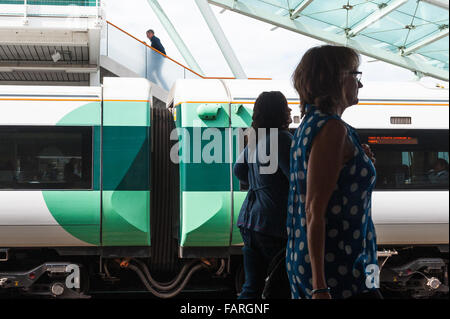 Train pulling into Clapham Junction train Station, London, England, UK. Stock Photo