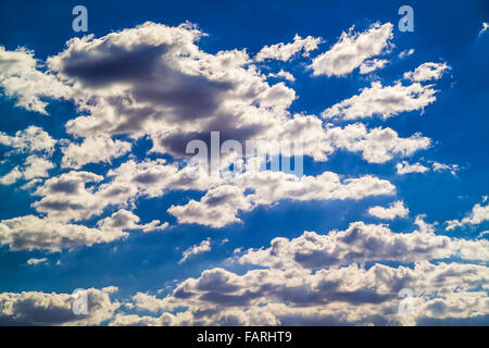 blue sky with fluffy white and grey clouds, Bega New South Wales Australia Stock Photo