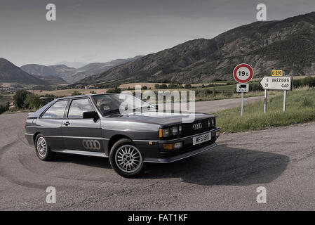 1982 Audi Quattro Coupe driving on mountain roads in the French Alps Stock Photo