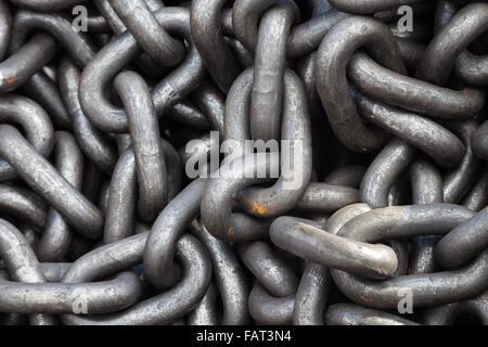 Metal rust chain heap texture industrial abstract background Stock Photo