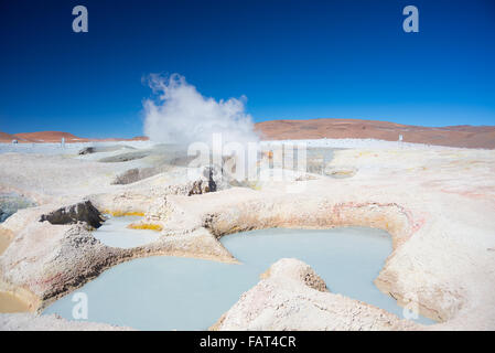 Steaming hot water ponds and mud pots in geothermal region of the Andean Highlands of Bolivia. Roadtrip to the famous Uyuni Salt Stock Photo